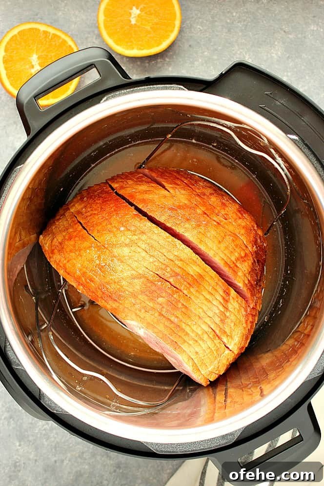 How to cook spiral-cut ham in the Instant Pot. Overhead shot of spiral-cut ham in the Instant Pot pressure cooker.