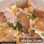 Smoked Turkey Chowder Served in a white bowl