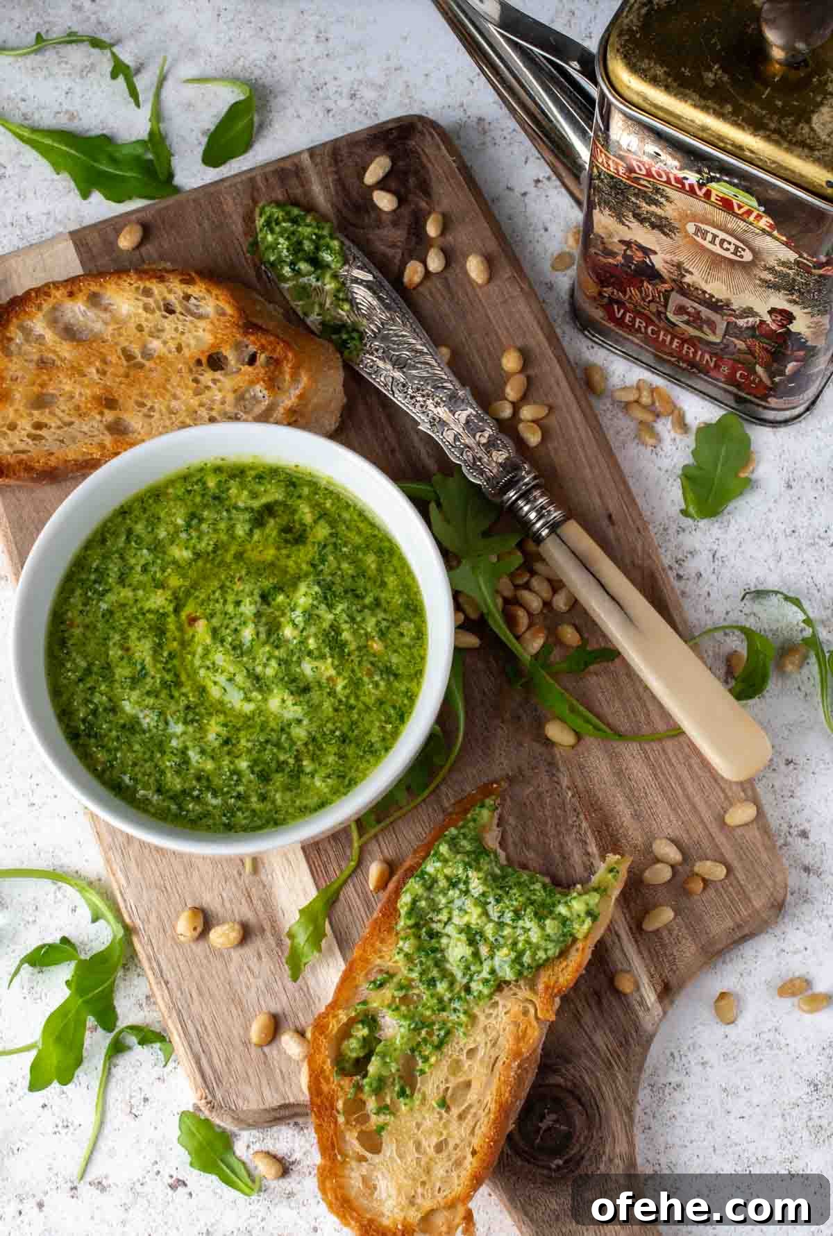 Fresh Arugula Pesto Recipe: Zesty Sauce for Pasta & Sandwiches 2 Arugula pesto, also known as rocket pesto, served with toasted ciabatta.