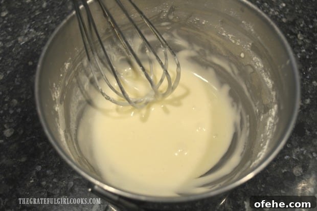 Cinnamon Roll Crescents - The Grateful Girl Cooks! A simple glaze is mixed to drizzle onto the baked cinnamon roll crescents once done.