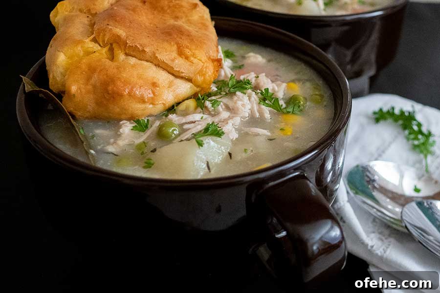 35+ Gluten-Free September Recipes for Seasonal Eating 12 chicken pot pie soup with a roll in a bowl