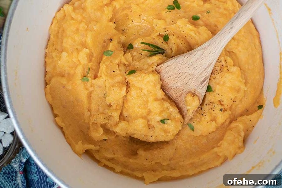 35+ Gluten-Free September Recipes for Seasonal Eating 19 overview of yam and sweet potato mash in a pot, vegetarian recipe