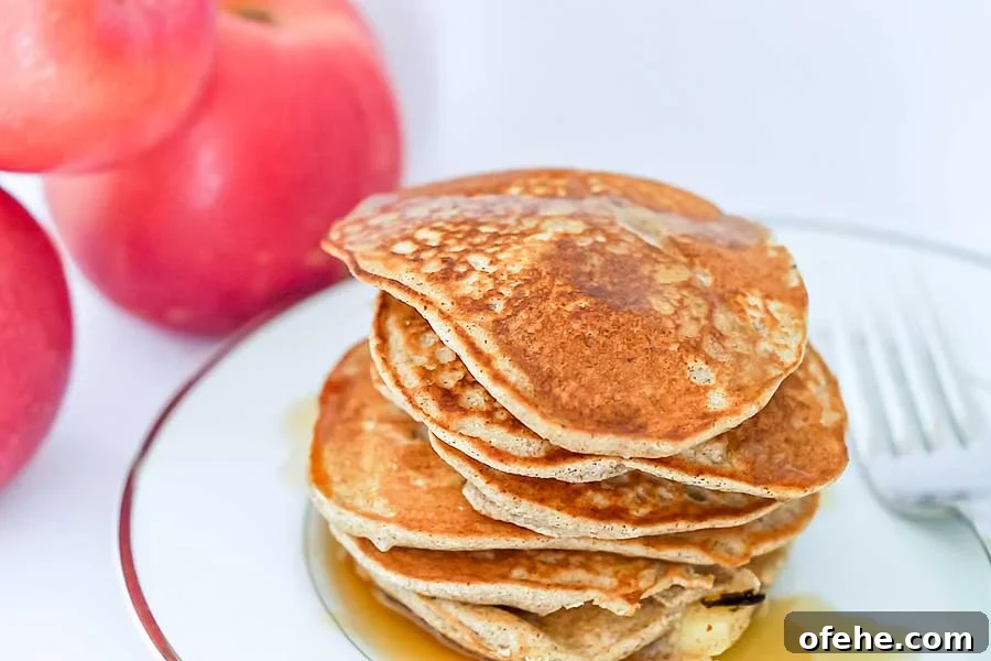 35+ Gluten-Free September Recipes for Seasonal Eating 33 stacked apple cinnamon buckwheat pancakes on a plate