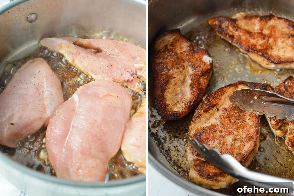 Creamy Roasted Red Pepper Chicken Recipe for Weeknight Dinners 5 Browning chicken breasts in a hot skillet.