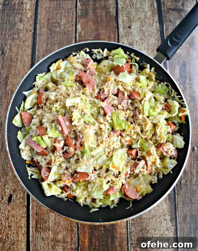51 Budget-Friendly Family Meals to Save Money Weekly 37 kielbasa and cabbage skillet with rice