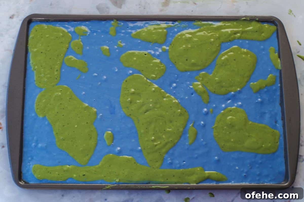 Colorful Earth Day Sheet-Pan Pancakes Recipe 14 Continents filled in on Earth Day pancake world map.