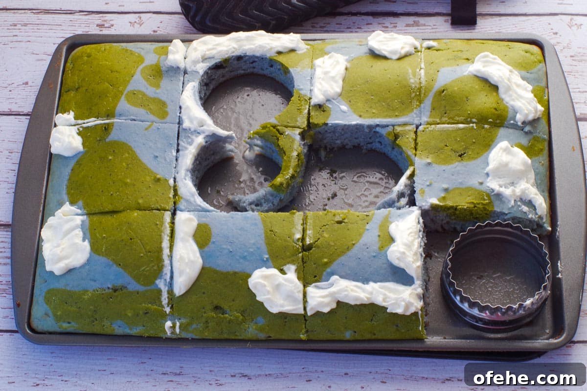Colorful Earth Day Sheet-Pan Pancakes Recipe 17 Earth Day Sheet Pan Pancakes being cut into