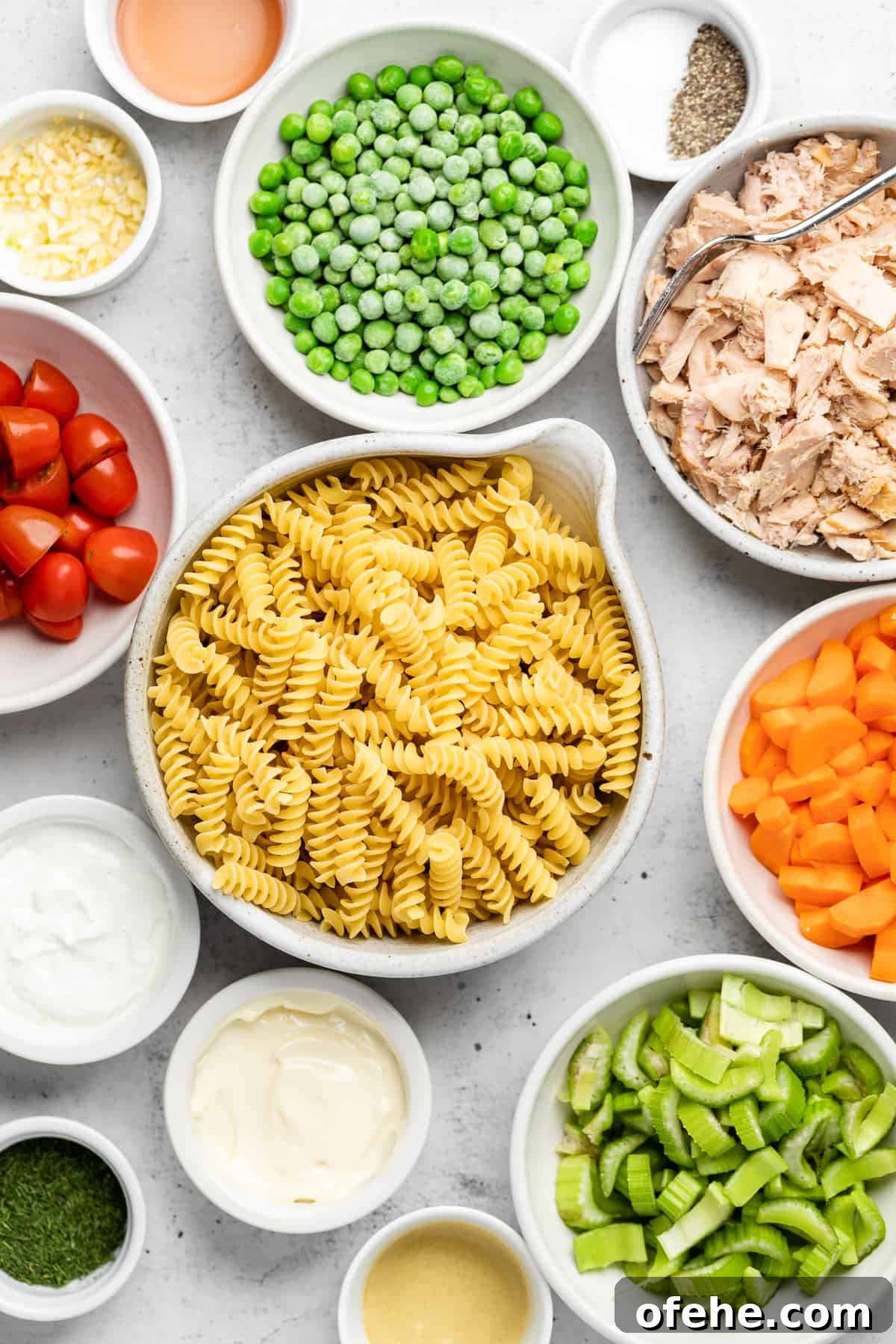 Lemon Tuna Pasta Salad with Fresh Herbs and Veggies 4 making tuna pasta salad