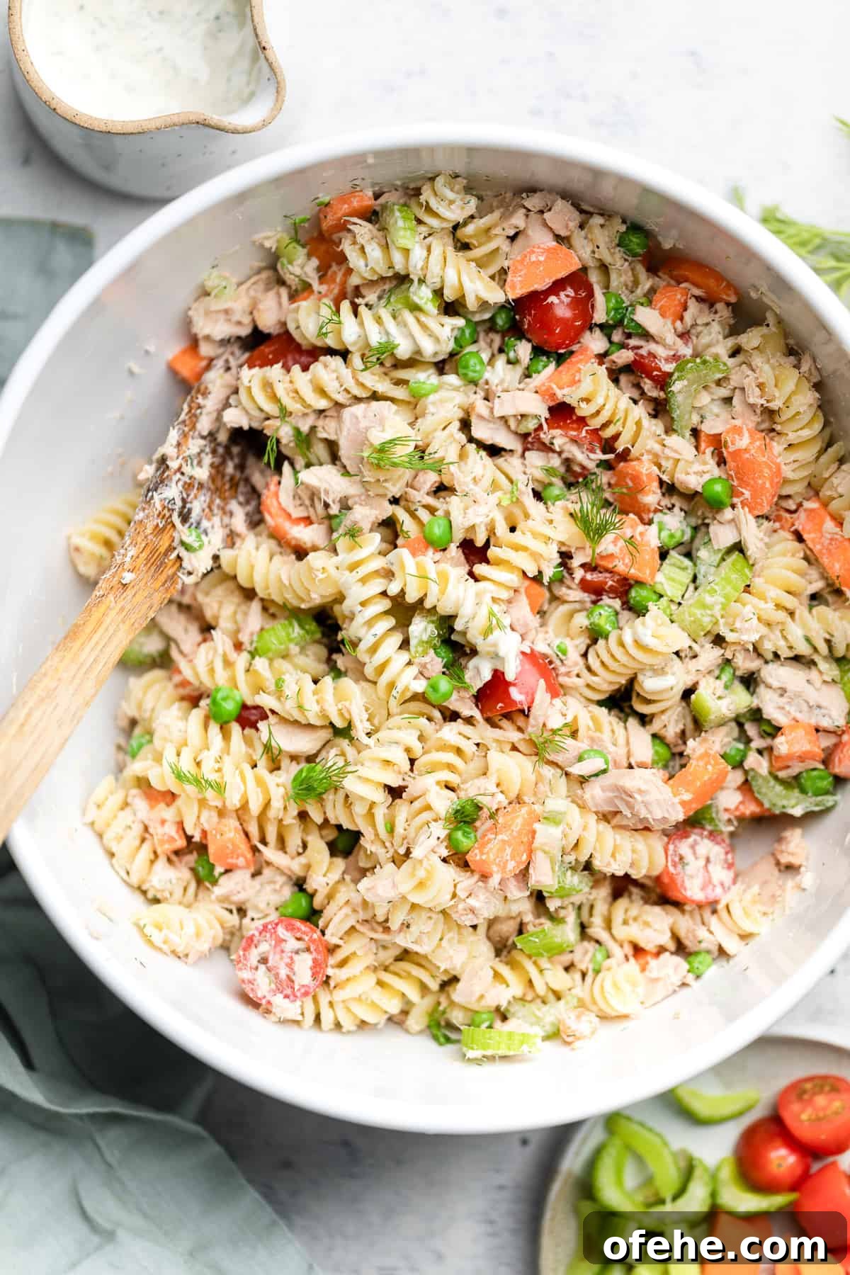 Lemon Tuna Pasta Salad with Fresh Herbs and Veggies 7 making tuna pasta salad