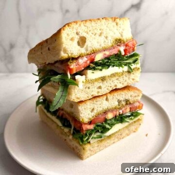 two slices of focaccia sandwich stacked on top of each other.