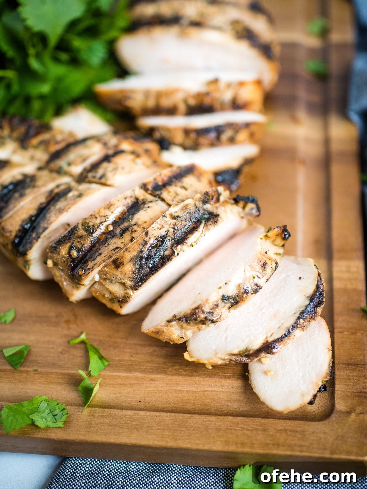 Honey Cilantro Lime Chicken Marinade Recipe for Grilled Chicken 3 sliced chicken on cutting board