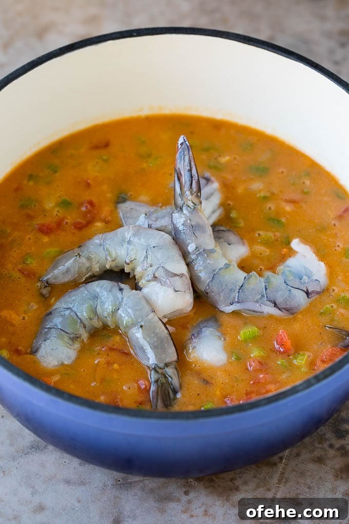 This shrimp etouffee is tender and succulent shrimp stewed with tomatoes, vegetables and seasonings. Raw shrimp in a homemade seafood sauce.