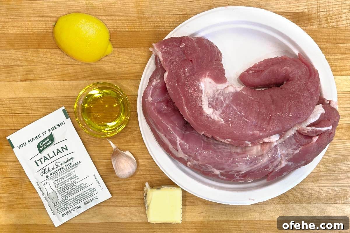 Juicy Oven-Roasted Pork Tenderloin Recipe 4 Easy Baked Pork Tenderloins ingredients shot on board