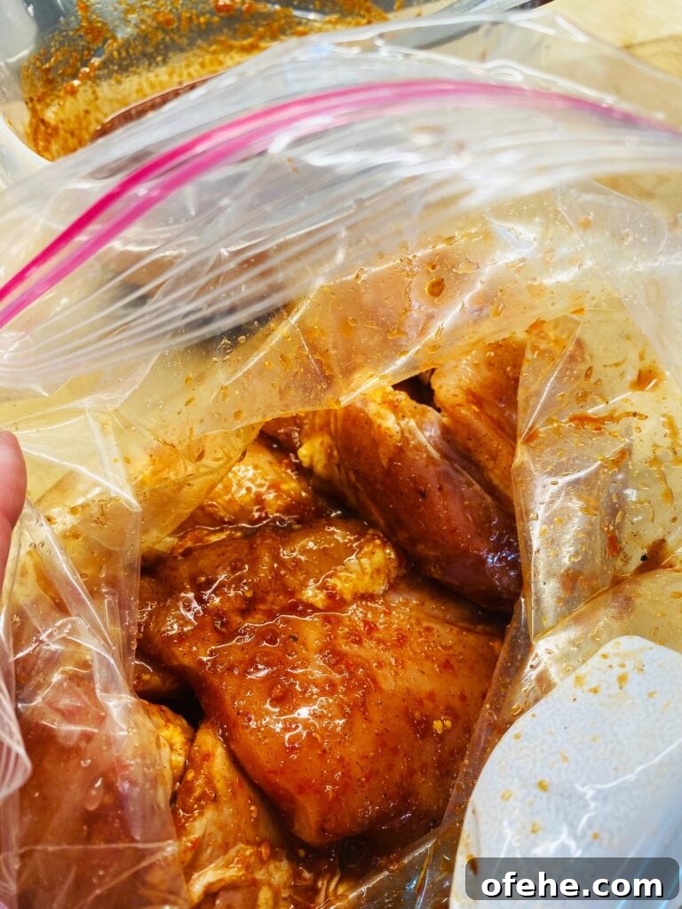 chicken marinating in a bag