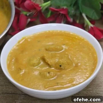 torachi uddamethi served in a white bowl.