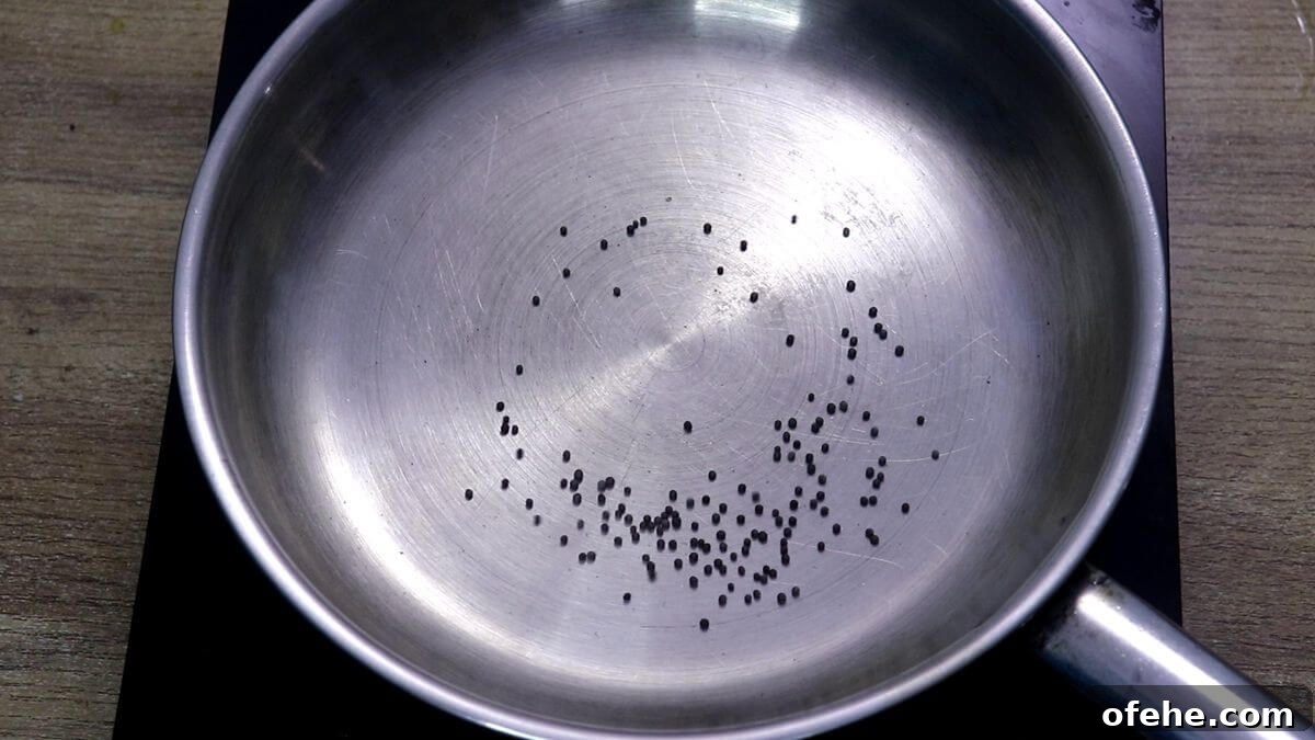 roasting mustard seeds for Goan ghotache sasav.