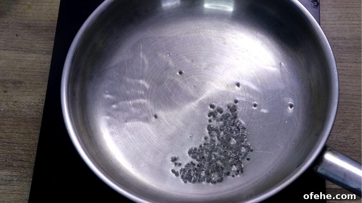tempering of mustard seeds for mango sasav.