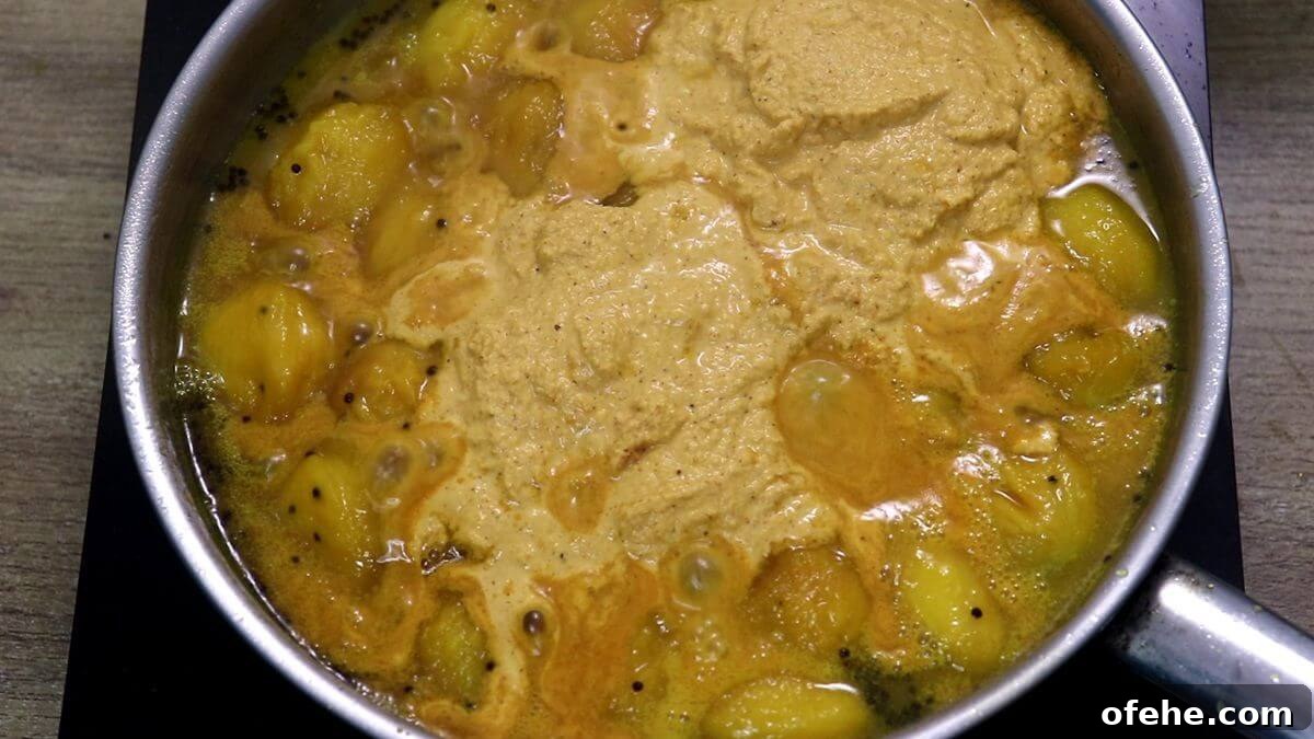 coconut mustard masala being prepared for mango sasav.