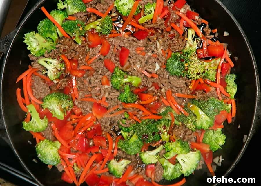 30-Minute Korean Ground Beef Stir-Fry Recipe (One-Pot) 8 sauce added to the korean ground beef stir fry