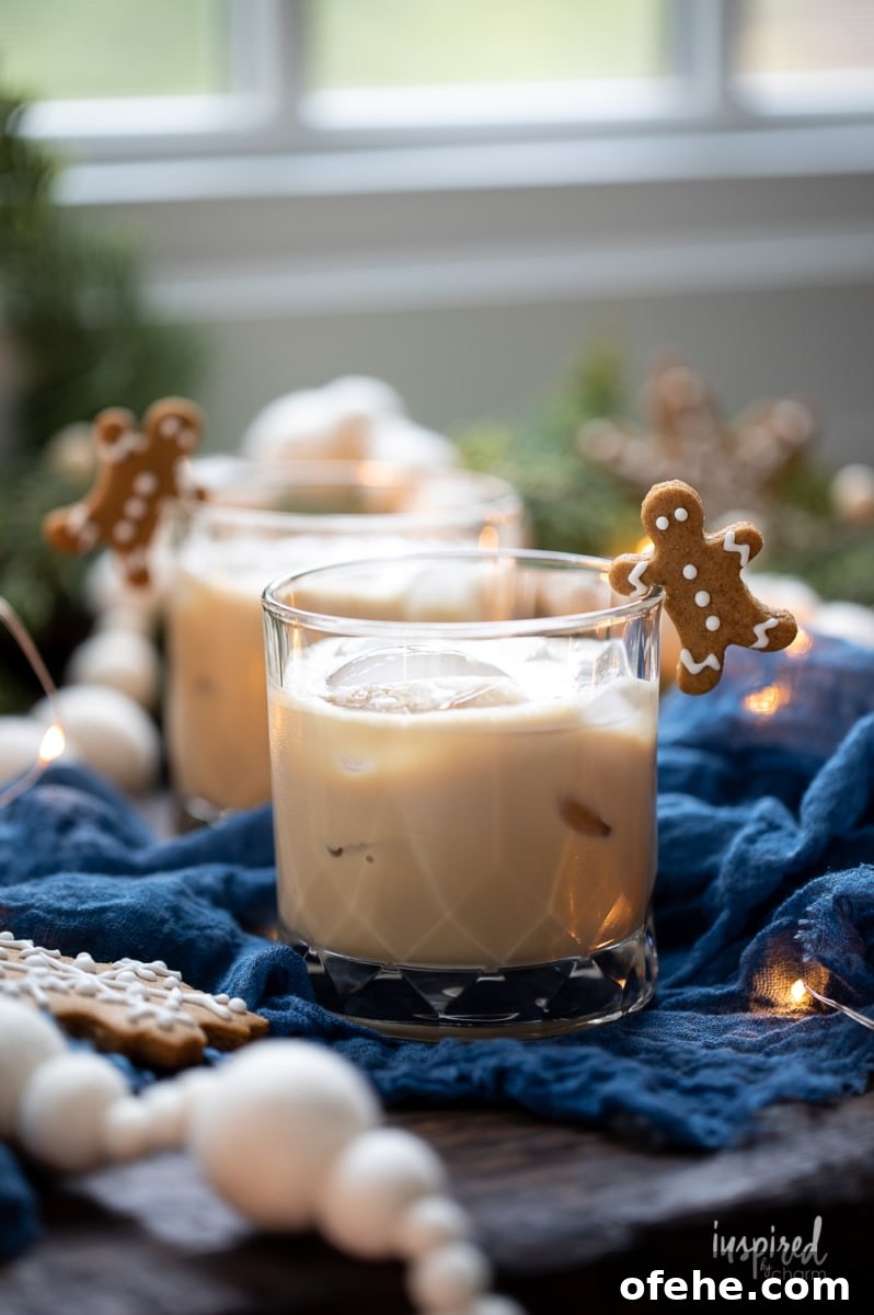Gingerbread White Russian Cocktail Recipe — Holiday Coffee Liqueur 3 gingerbread White Russian in rocks glass.