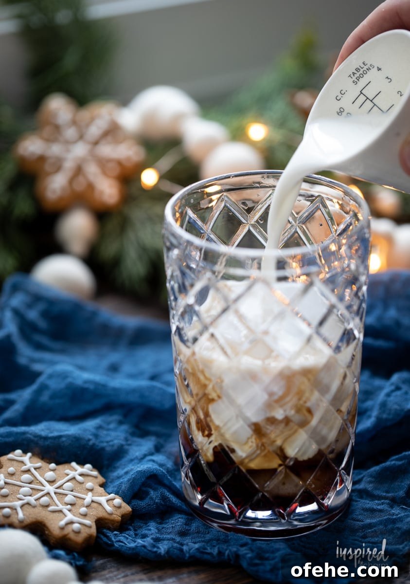 Gingerbread White Russian Cocktail Recipe — Holiday Coffee Liqueur 7 making Gingerbread White Russians.