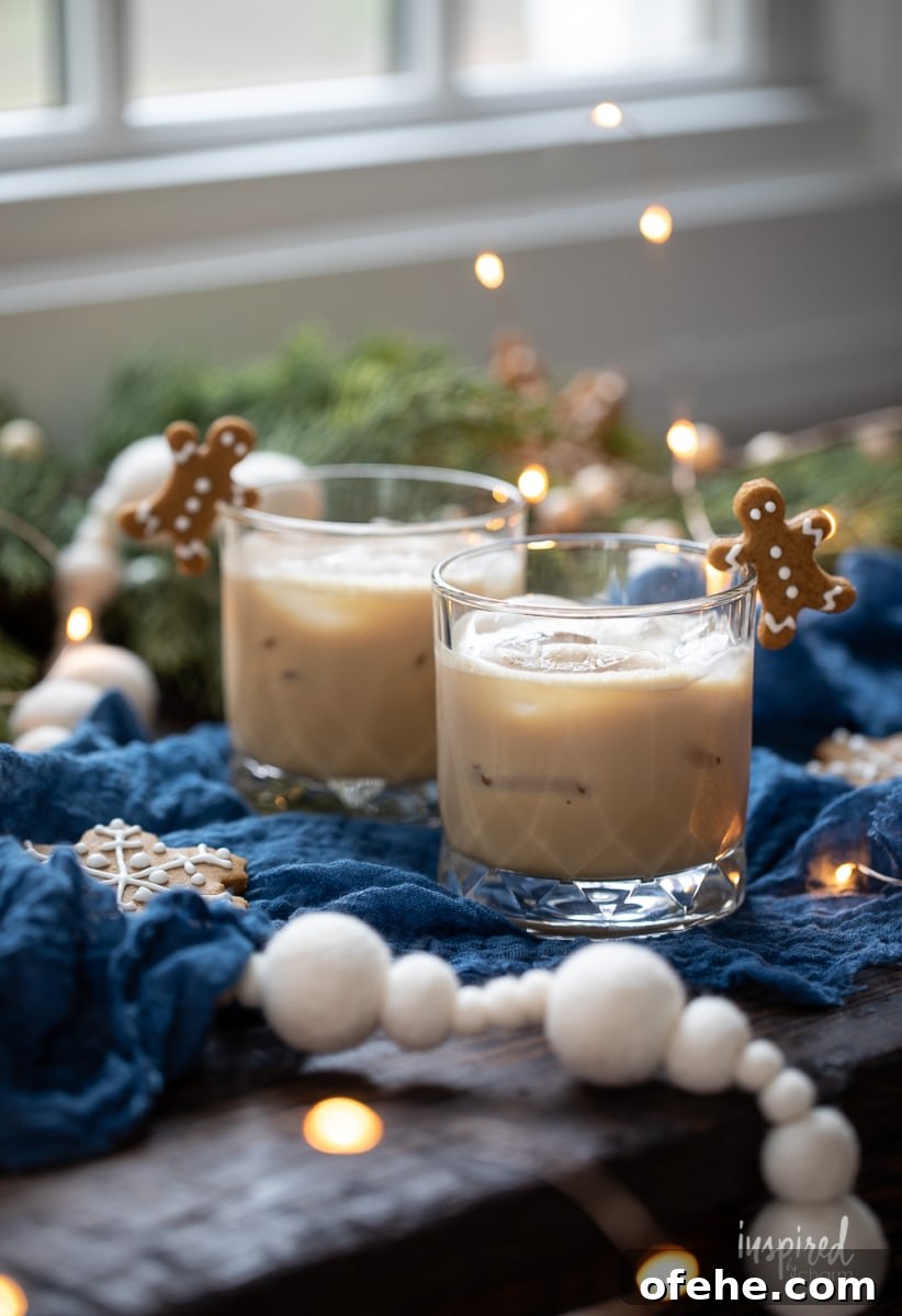 Gingerbread White Russian Cocktail Recipe — Holiday Coffee Liqueur 9 Gingerbread White Russian with gingerbread man garnish.