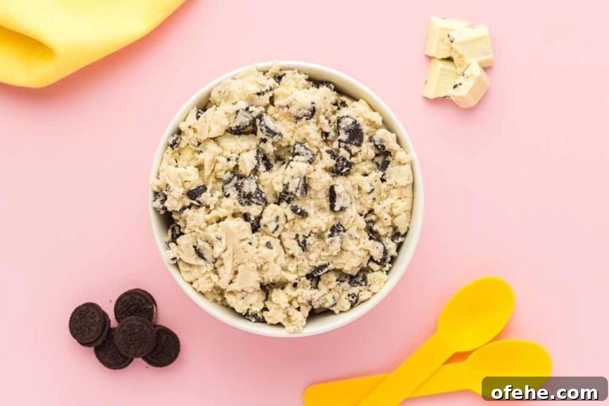 Edible Oreo Cookie Dough Recipe You Can Eat Raw 3 overhead view of a serving of oreo cookie dough in a cup.