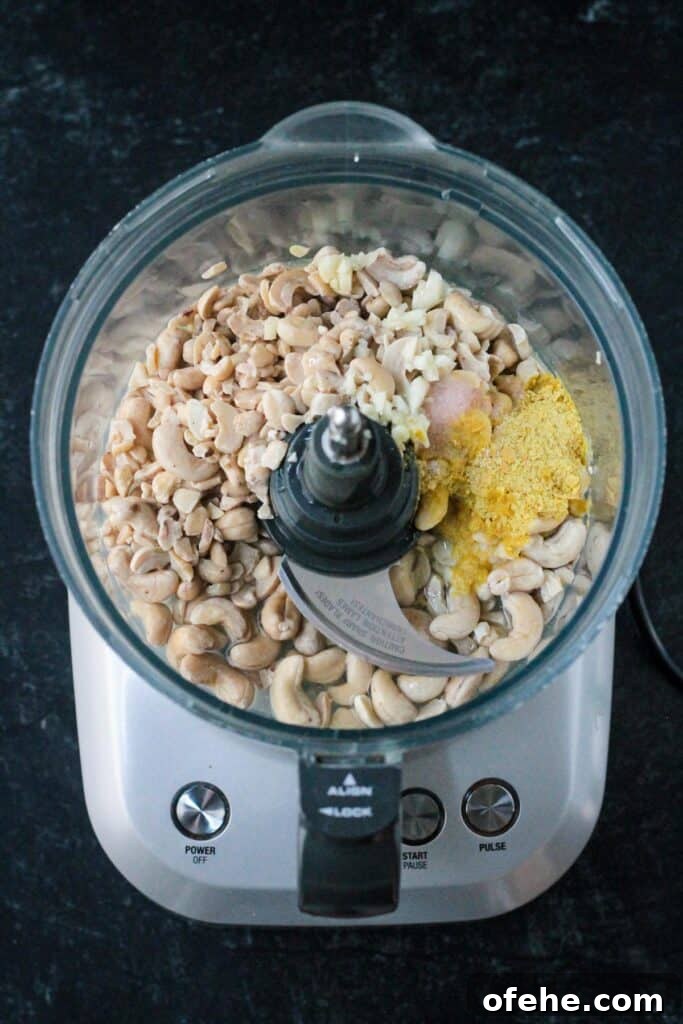 Creamy Vegan Cashew Ricotta Recipe for Pasta & Pizza 4 Recipe ingredients in a food processor.