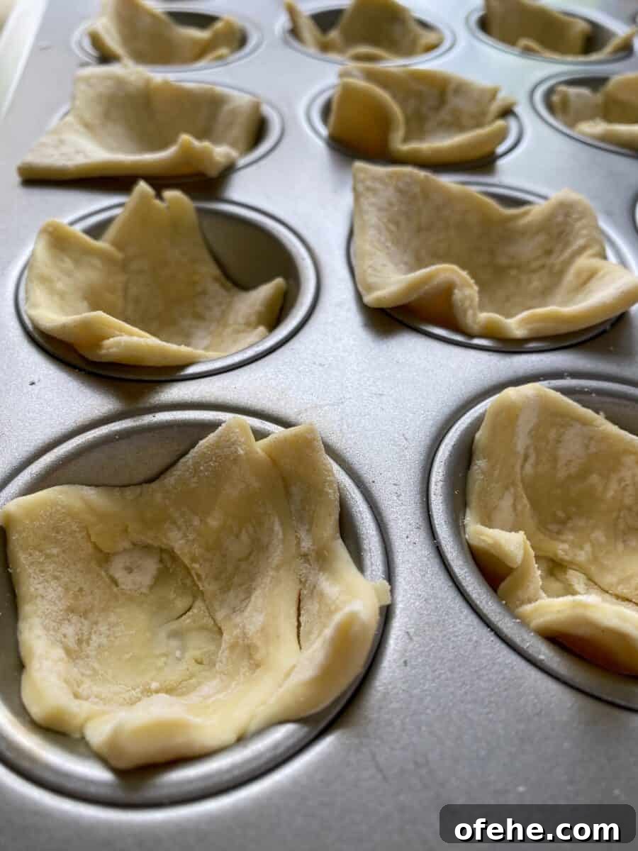 Philly Cheesesteak Bites Recipe: Savory Mini Sandwich Appetizers 6 Puffed pastry dough, raw, placed into mini-muffin cups.