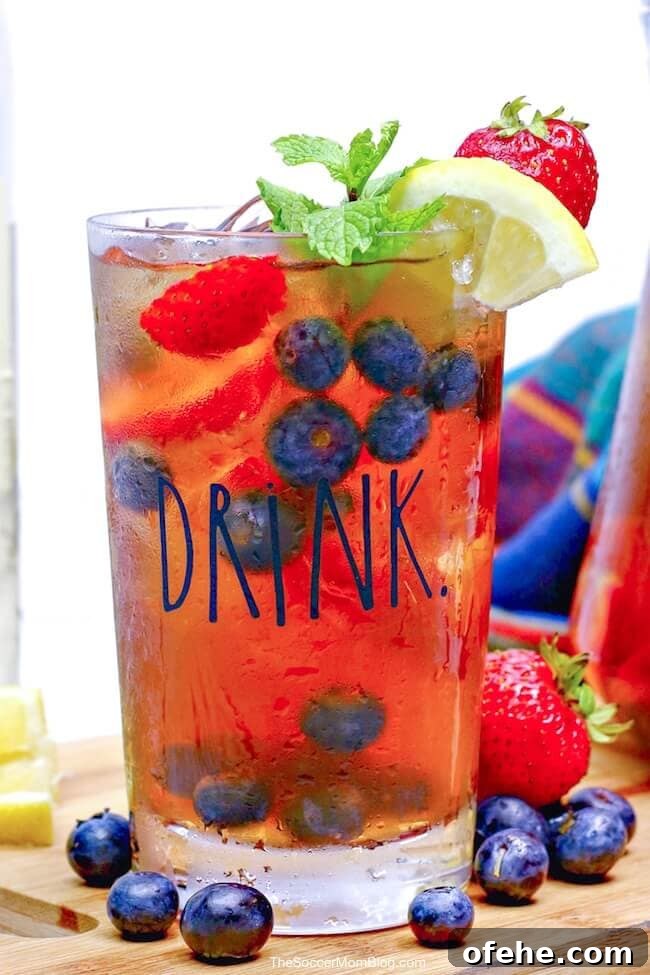 Tipsy Texan Cocktail Recipe: How to Make the Signature Texan Drink 9 sweet tea sangria in tall glass