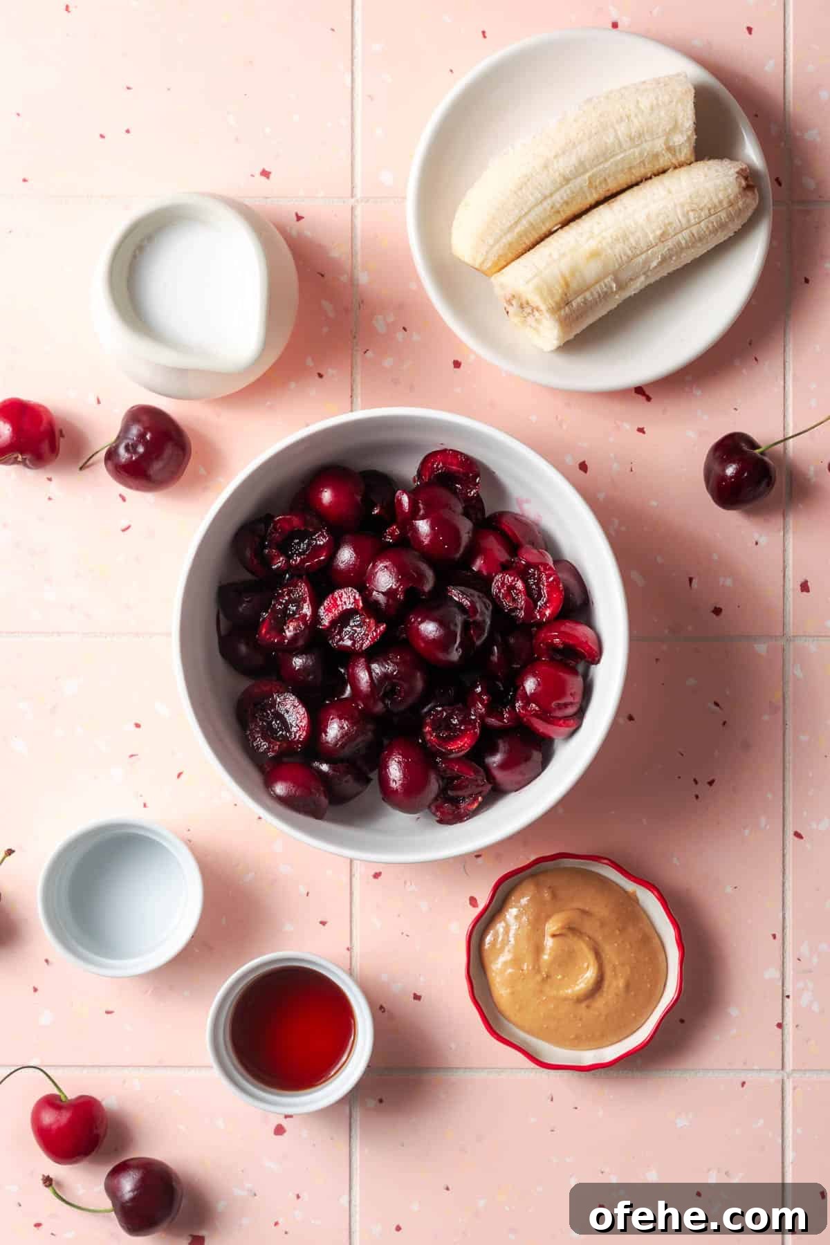 Creamy Cherry Smoothie Recipe for Fresh, Fruity Mornings 3 Ingredients for a sweet cherry smoothie sitting on a tile counter.