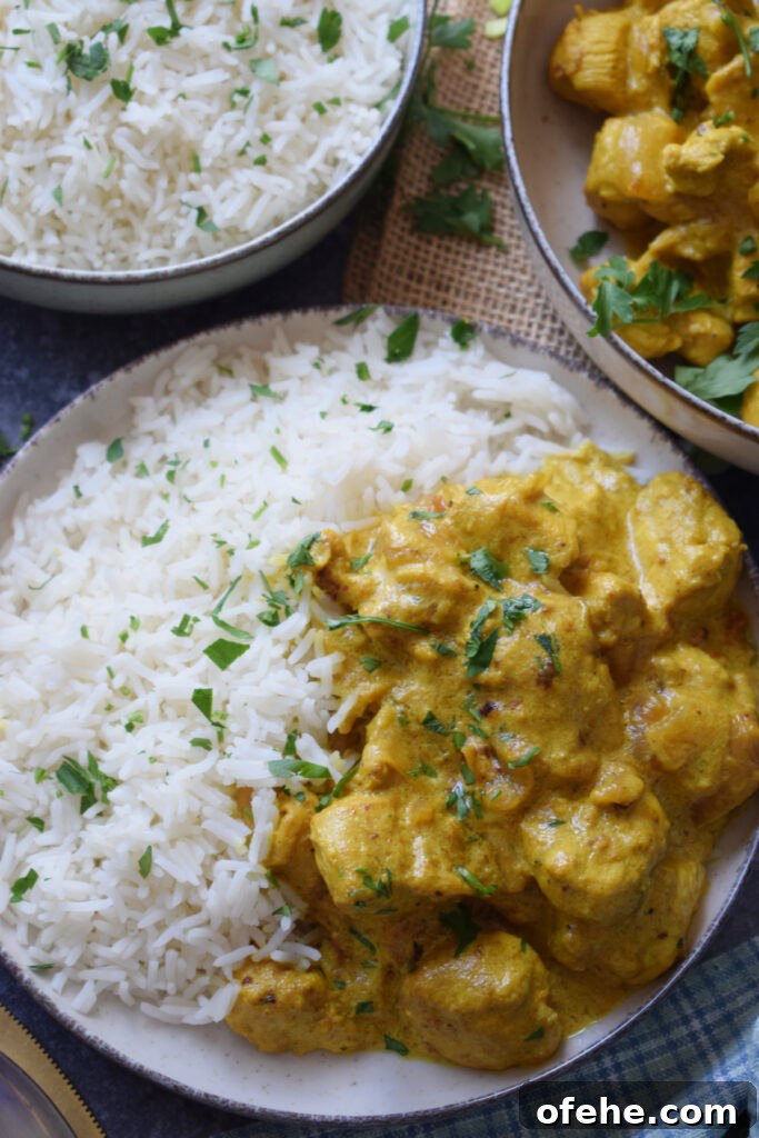 Creamy Chicken Masala Recipe: Rich, Spiced Indian Curry 3 Spicy chicken masala with rice.