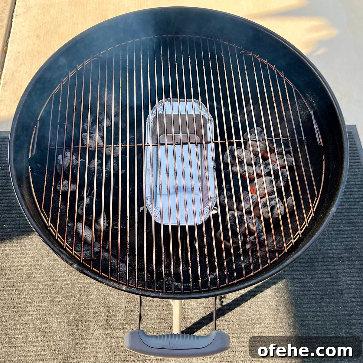 Grilled Chicken Leg Quarters with Basil Pesto Sauce 11 aluminum drip pan on charcoal grate