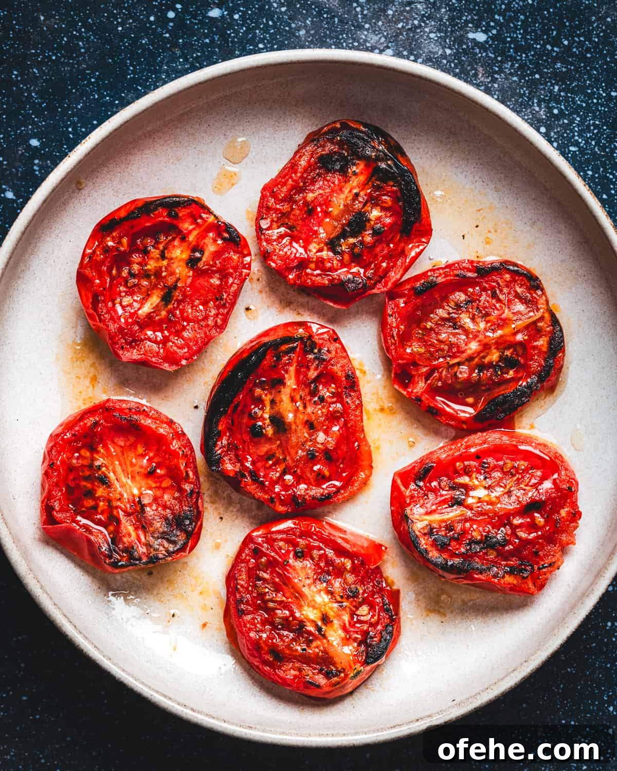 Fire roasted tomatoes on a plate