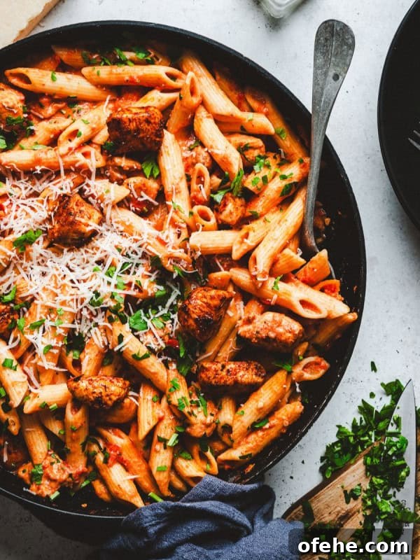 Cajun Chicken Pasta served in a black bowl and photographed from the top.