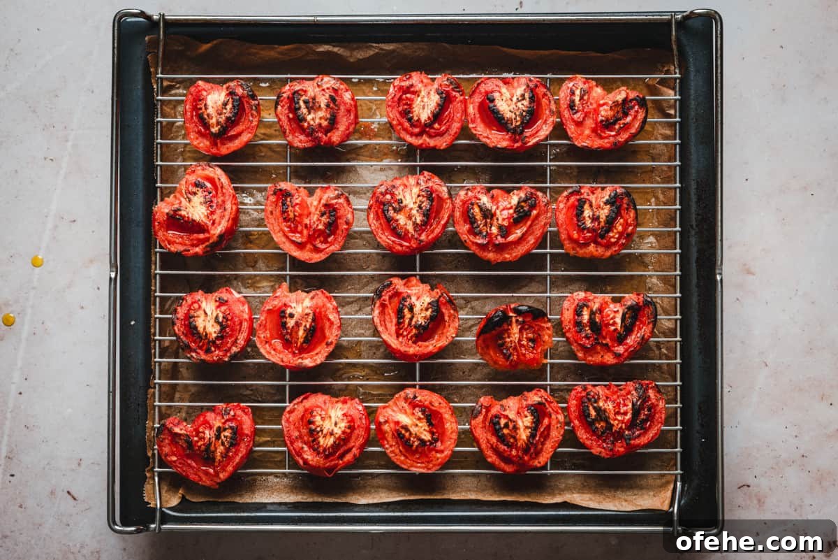 Cooked fire roasted tomatoes on wire rack