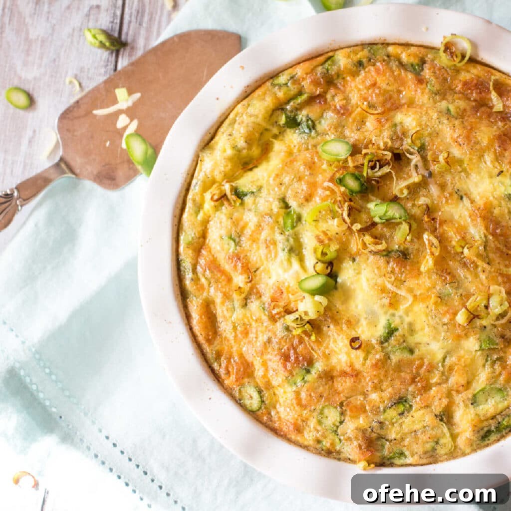 Asparagus quiche topped with crispy leeks.