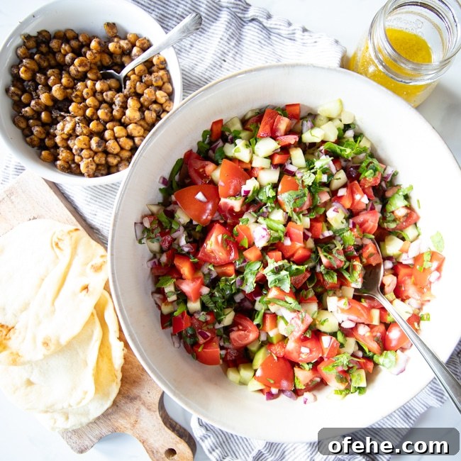 Mediterranean chickpea salad with cucumbers and tomatoes.