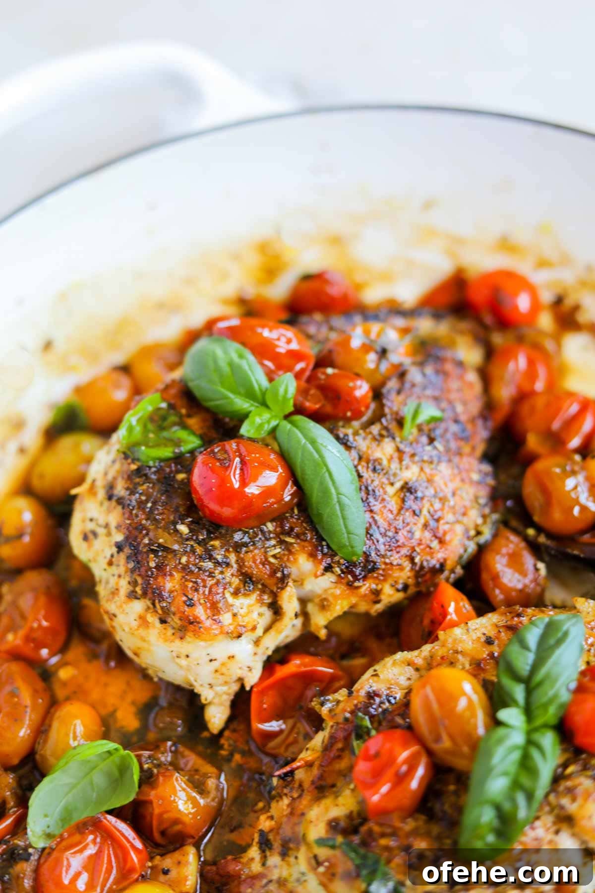20 Delicious Dishes to Pair with Asparagus 20 Mozzarella-stuffed chicken pomdoro in a pan in cherry tomato sauce with basil.