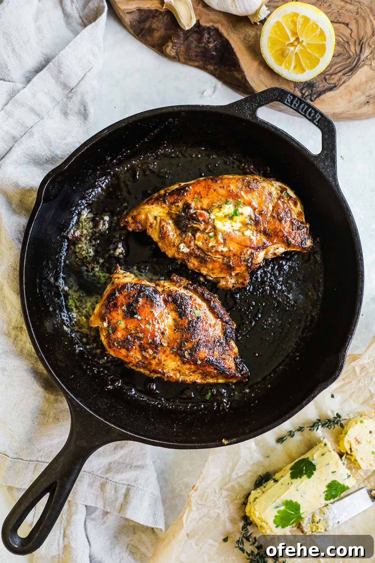 20 Delicious Dishes to Pair with Asparagus 7 Juicy cast iron chicken breast with herbed roasted garlic butter and lemon juice in a Lodge cast iron skillet.