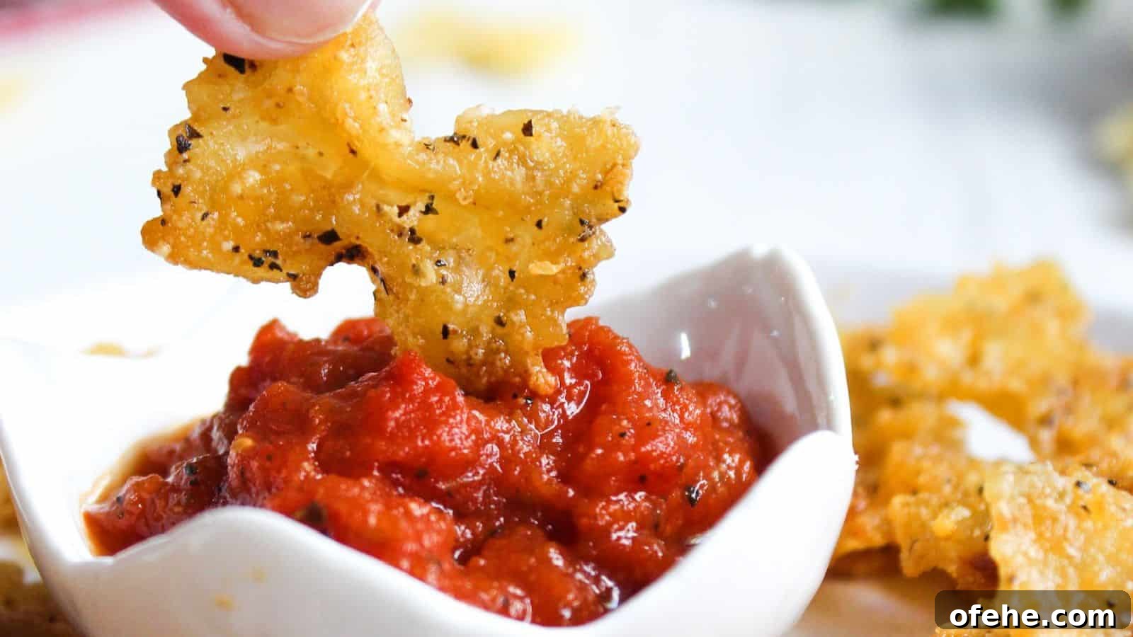 30 Quick Appetizers to Impress Guests Without Fuss 17 Pasta chips in a white bowl.