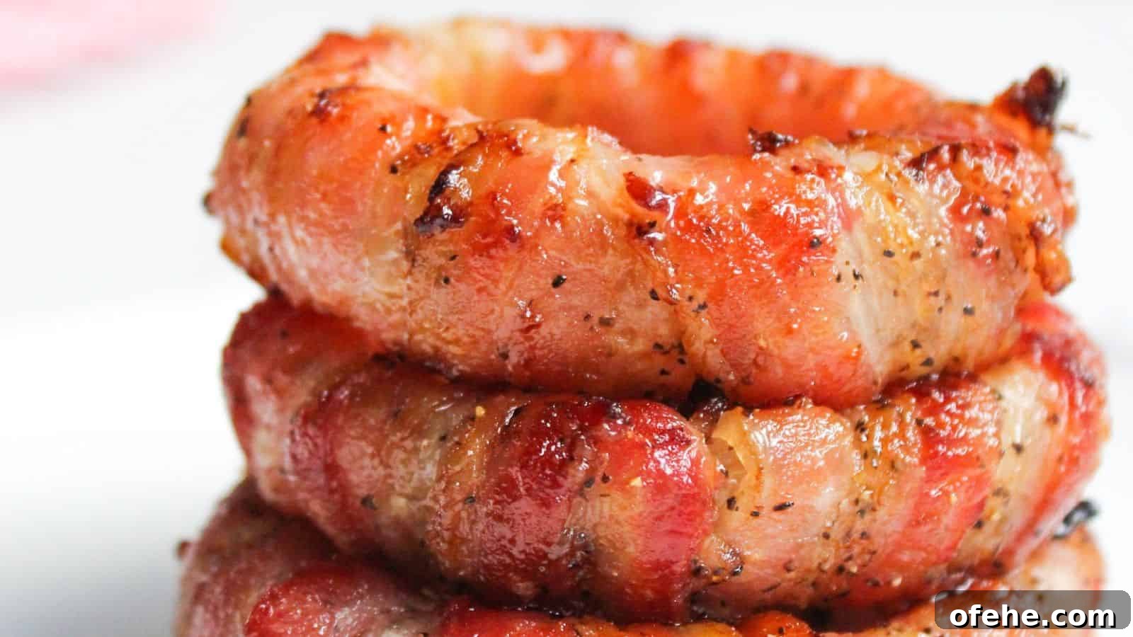 30 Quick Appetizers to Impress Guests Without Fuss 5 Stack of bacon wrapped onion rings.