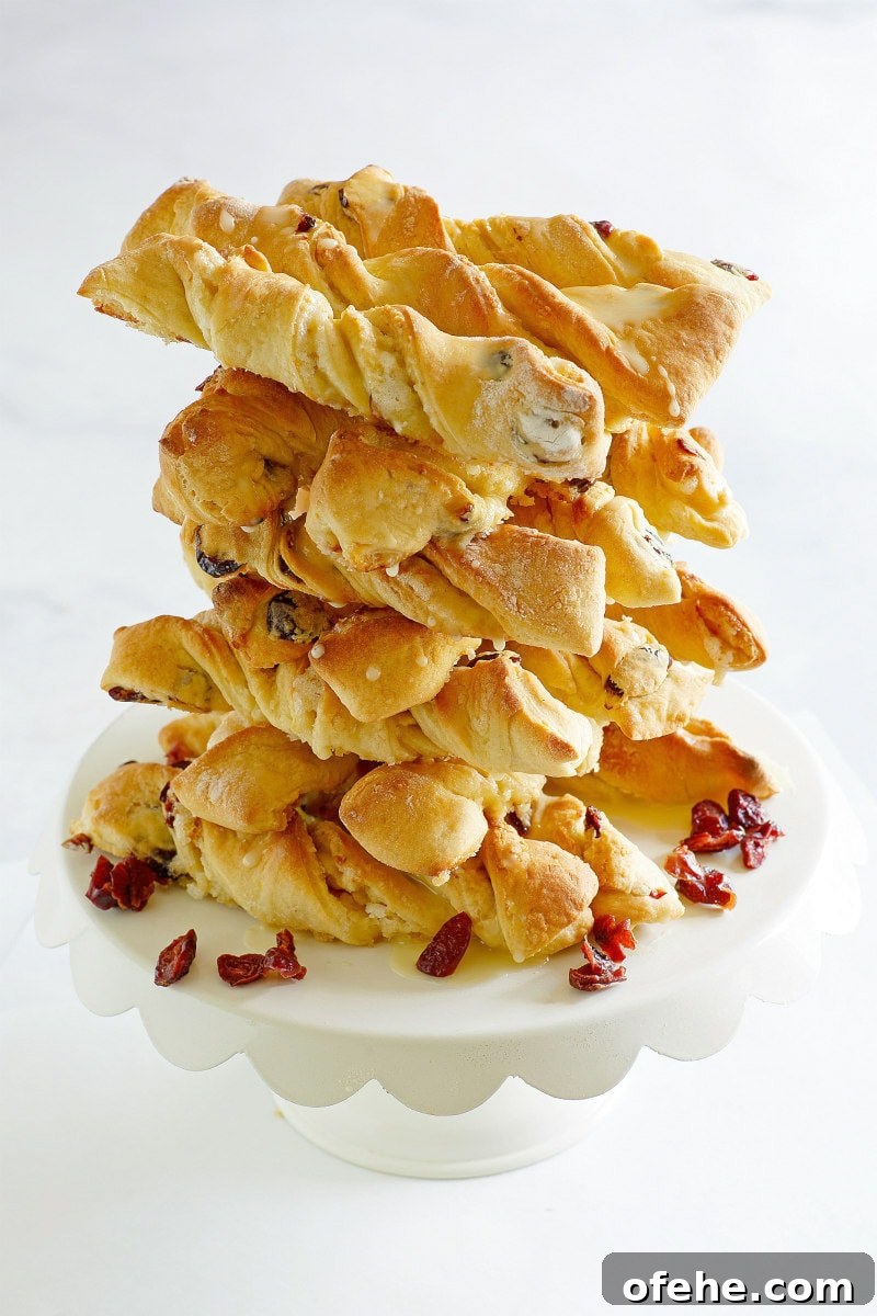 Orange Cranberry Twists : a delicious sweet pastry that is perfect for fall breakfast or brunch. Stack of Orange Cranberry Twists