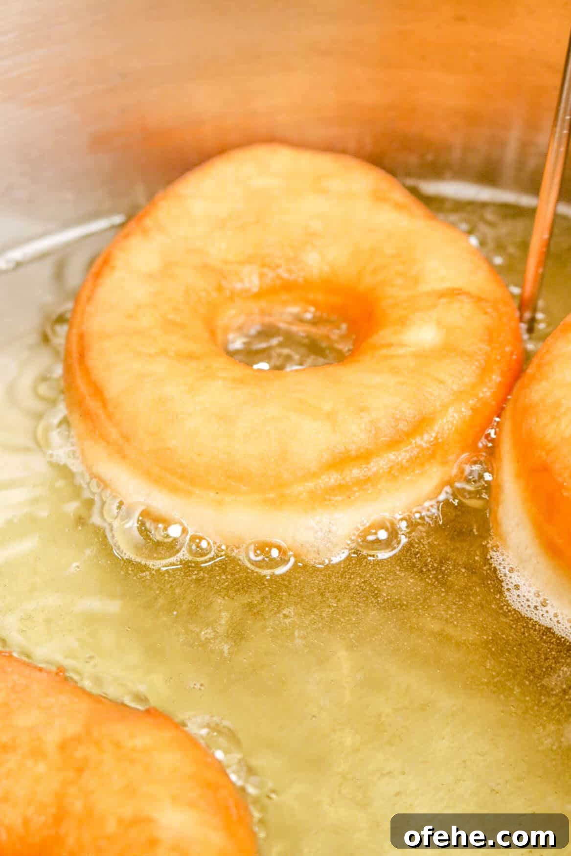 fried doughnut in oil