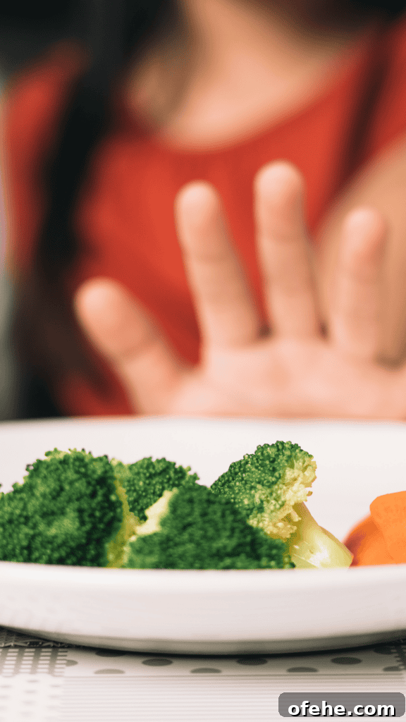 19-Day Toddler Meal Plan with Simple, Nutritious Recipes and Ideas 2 Little Girls Hand Pushing a Plate of Food Away From Her