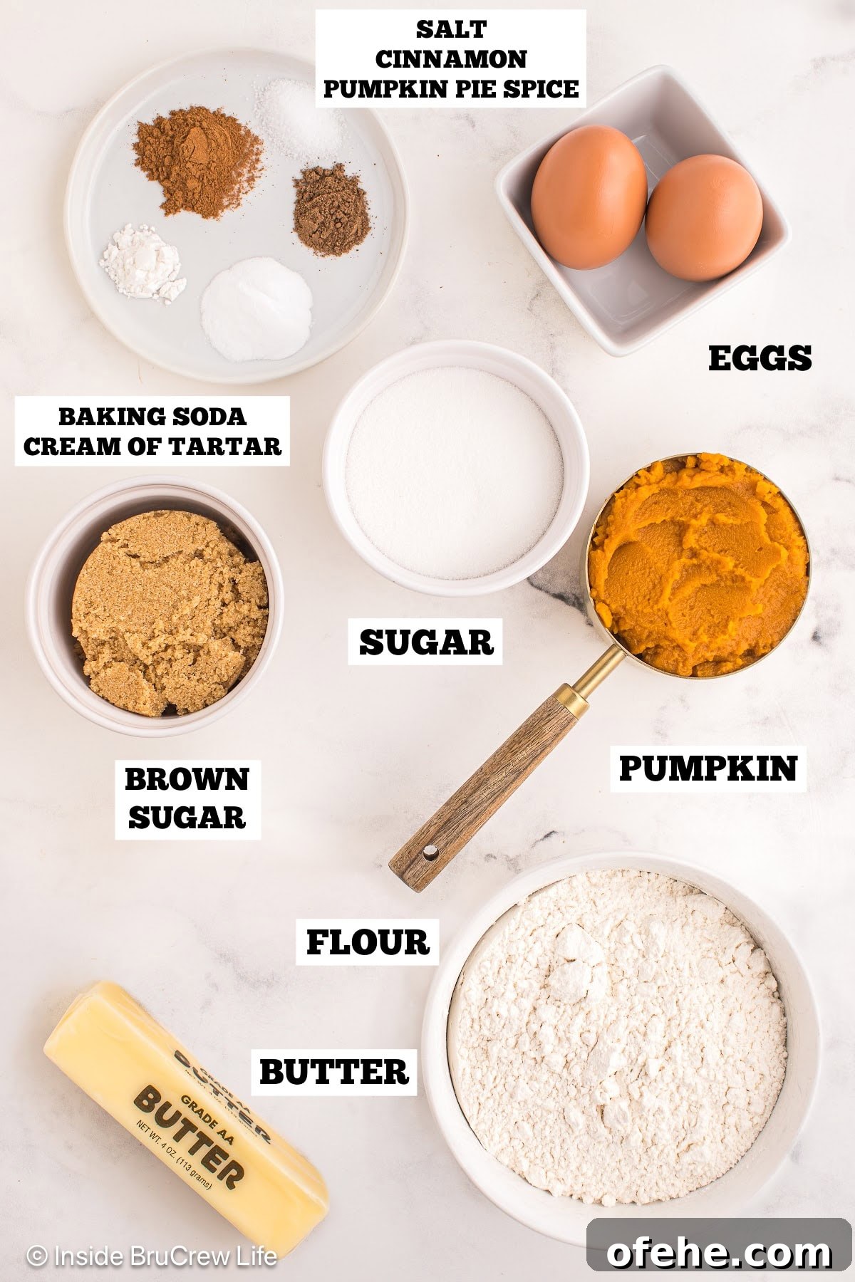 Pumpkin Snickerdoodle Cookies — Soft Fall Spice Recipe 3 A white board with bowls of ingredients needed to make pumpkin cookies.