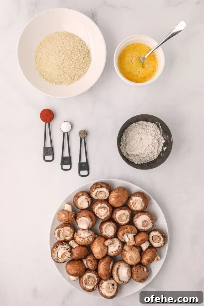 Crispy Air-Fried Mushrooms Recipe for Quick Snacks 4 Ingredients needed to make fried mushrooms on a white table with mushrooms on a white plate
