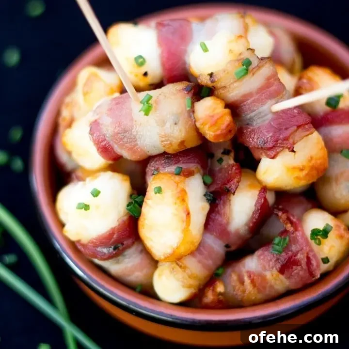 Bacon Halloumi Bites in a serving dish with cocktail sticks