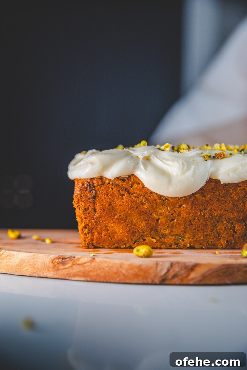 Zucchini and Pistachio Loaf Recipe for Moist Quick Bread 4 Courgette & Pistachio Loaf with Vanilla Frosting - Georgie Eats