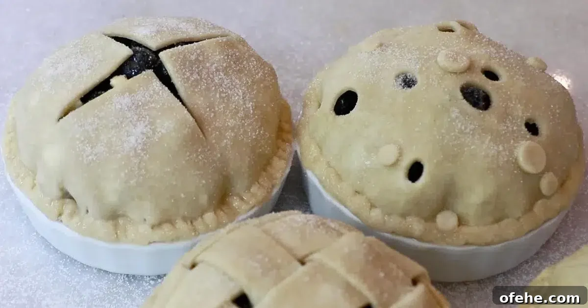 sprinkling sugar over blueberry pie